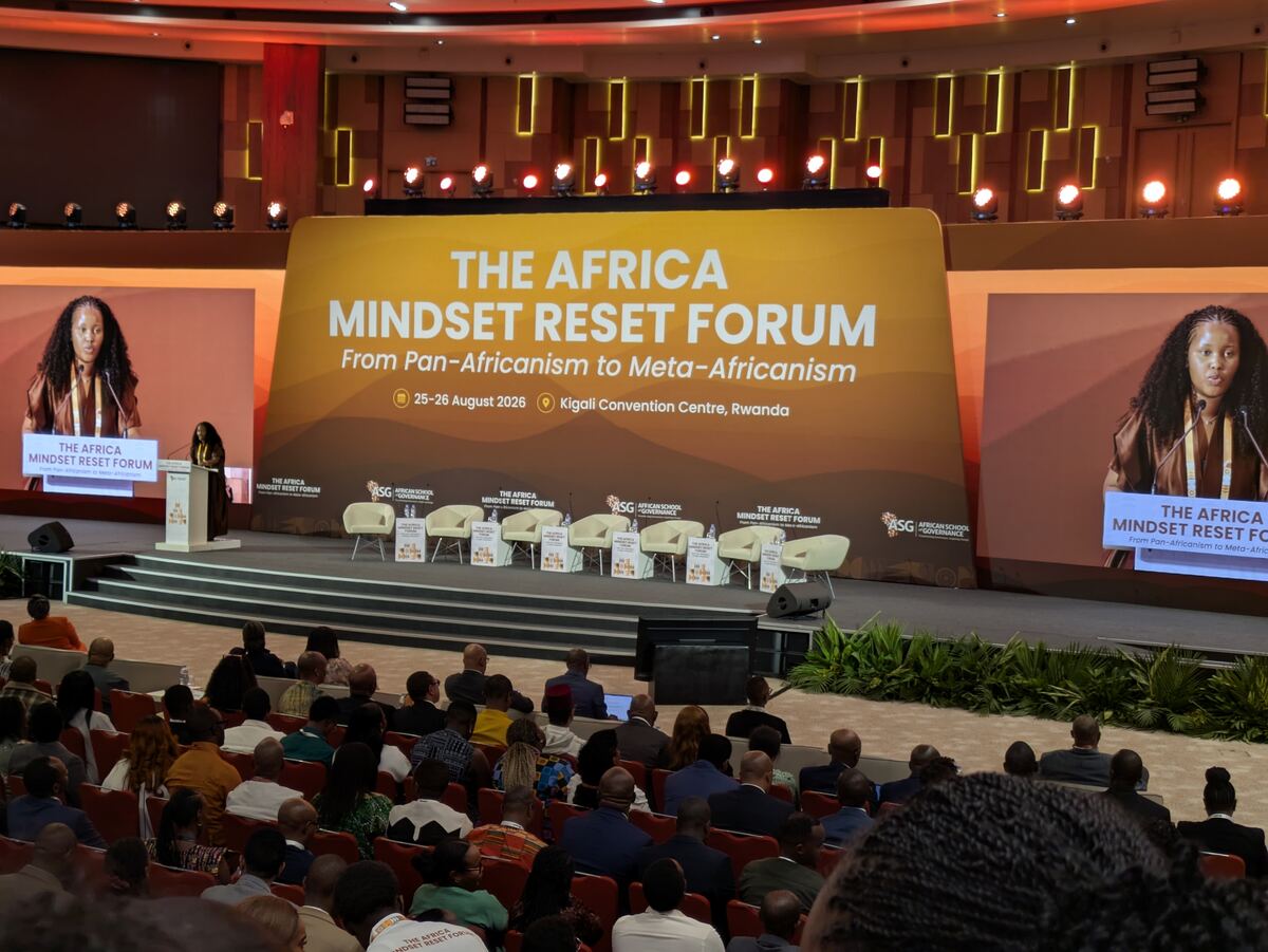 Africa reset forum stage featuring orange and white theme at the Kigali Convention Center Auditorium