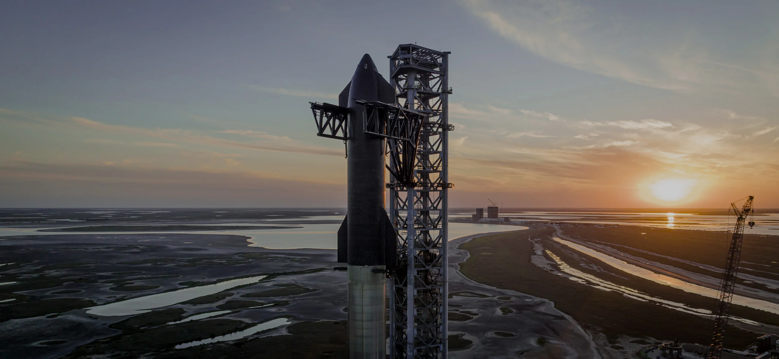 Cover image for SpaceX's 'Mechazilla' Catches Super Heavy Booster: A Giant Leap for Rocket Reusability