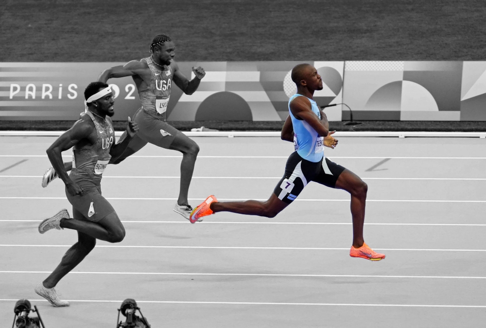 Letsile Tebogo pulls ahead to win the men's 200m race, finishing ahead of Kenny Bednarek and Noah Lyles. Image credit: Africa Top Sports