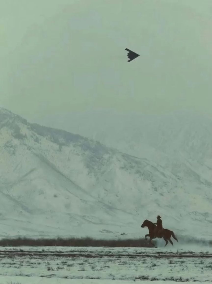 Cowboy and B2 stealth bomber