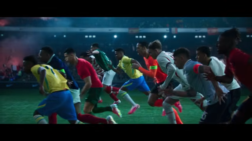 Football players running across a pitch in a 6-minute Nike short film