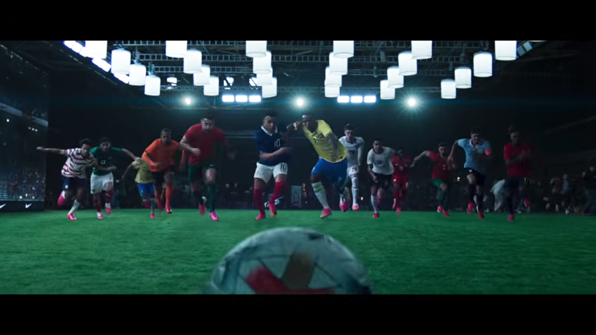 Football players running towards a football all in competition showing Ronaldo alongside Mbappé, Vini Jr., Haaland
